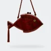 Carvedcarved wooden fish clutch